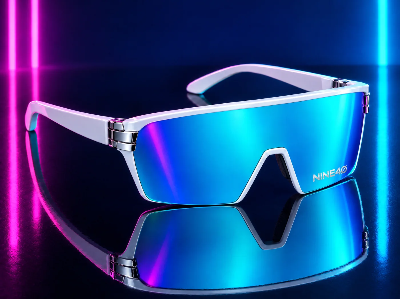 NINE40 South Beach flat-top shield sunglasses in gloss white with an electric cyan mirror lens and the NINE40 mark on the lens